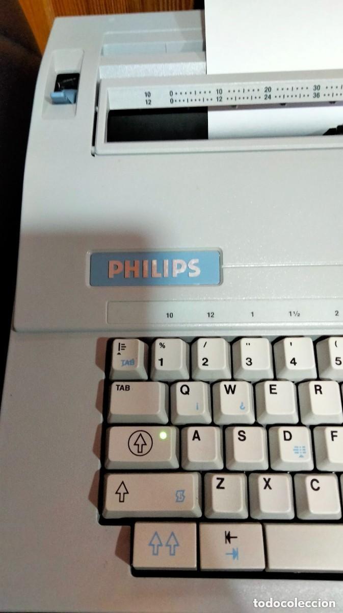 Antig&uuml;edades: maquina de escribir philips electrica-nueva