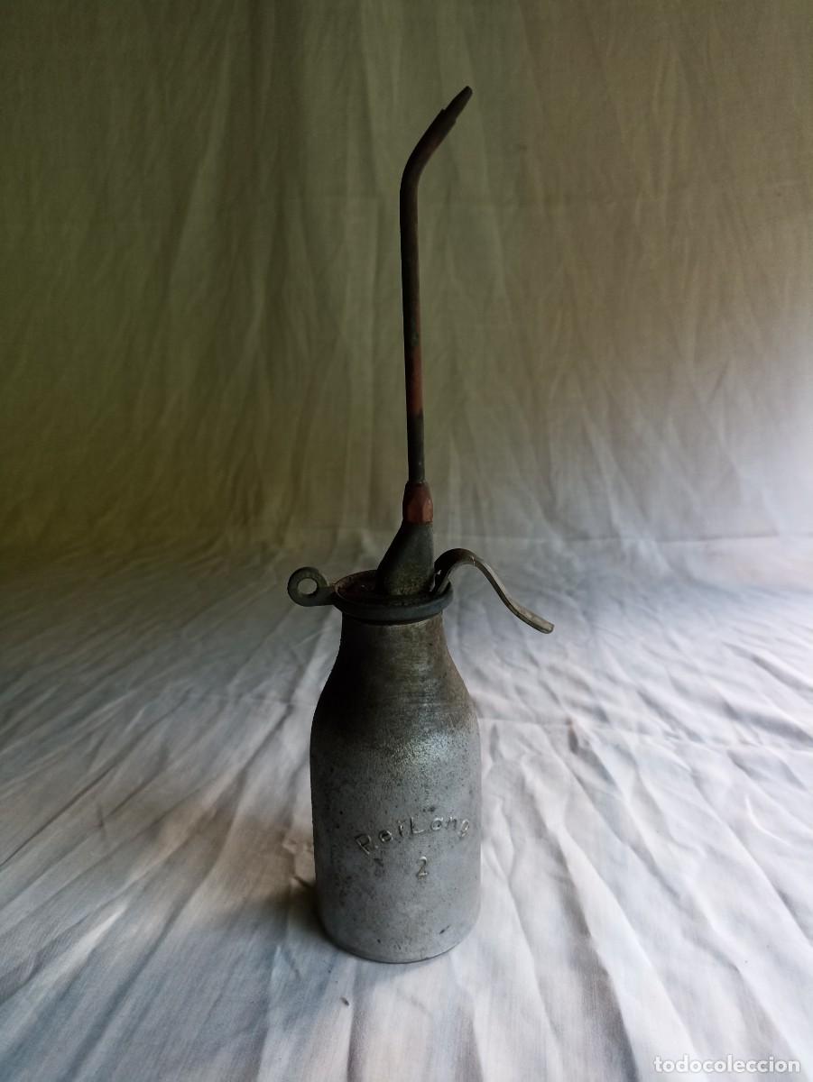 Antig&uuml;edades: Vieja aceitera Reilang - Foto 1