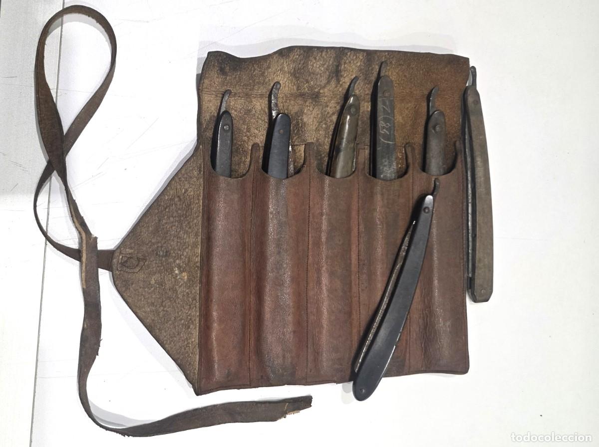 Antig&uuml;edades: Antiguo estuche de cuero para navajas de barbero, con 5 ejemplares m&aacute;s 2 extras, 7 en total.