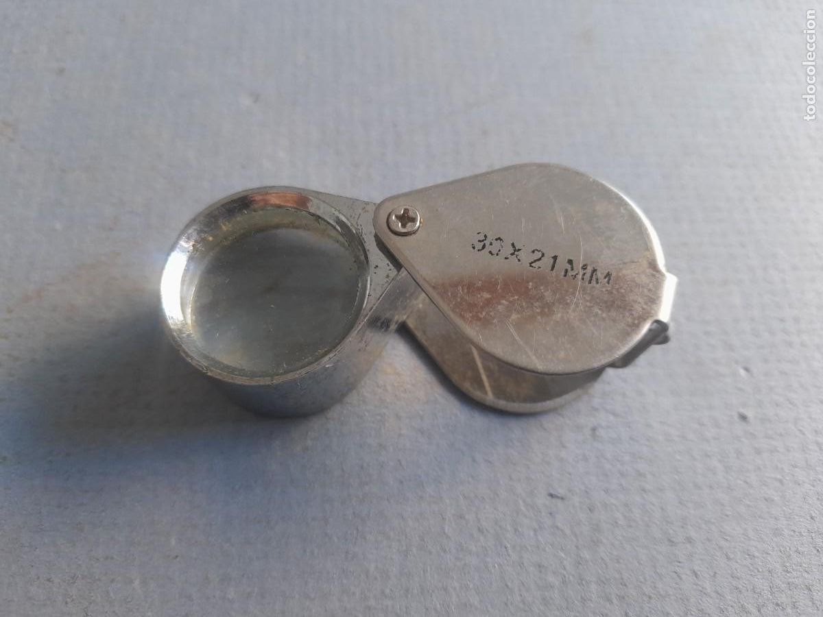 Antig&uuml;edades: Peque&ntilde;a lupa de 31x20mm, con gancho para colgar