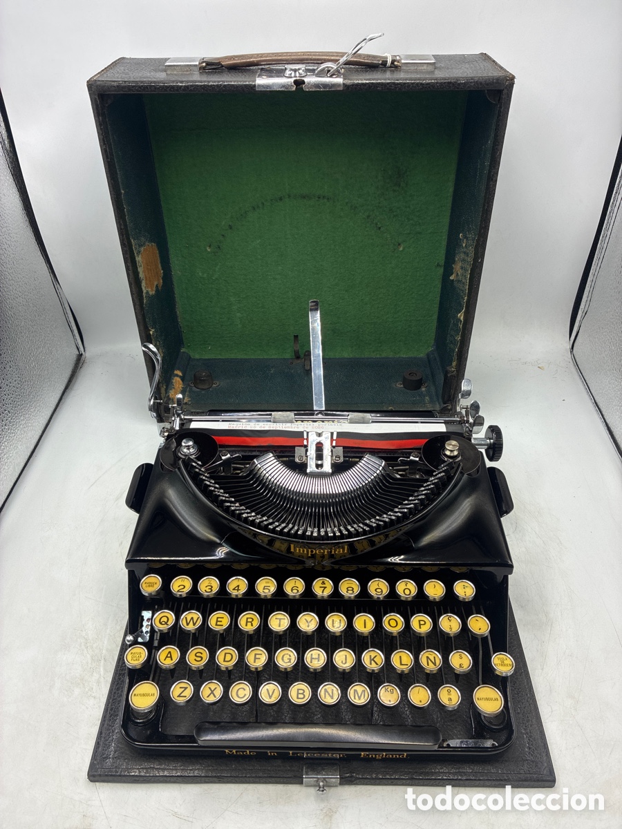 Antig&uuml;edades: M&aacute;quina de Escribir Imperial Portable.