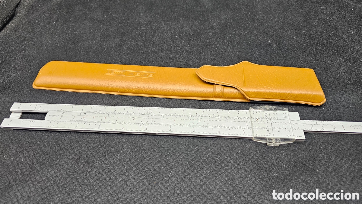 Antig&uuml;edades: regla de c&aacute;lculo anal&oacute;gica vintage de aluminio