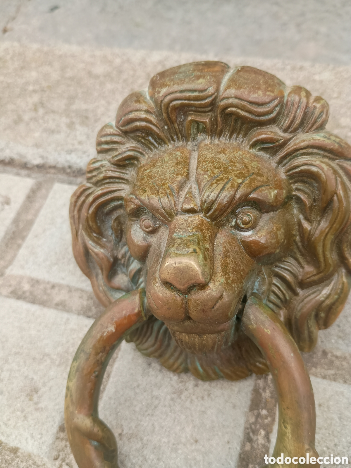 Antig&uuml;edades: Tirador bronce cabeza de le&oacute;n