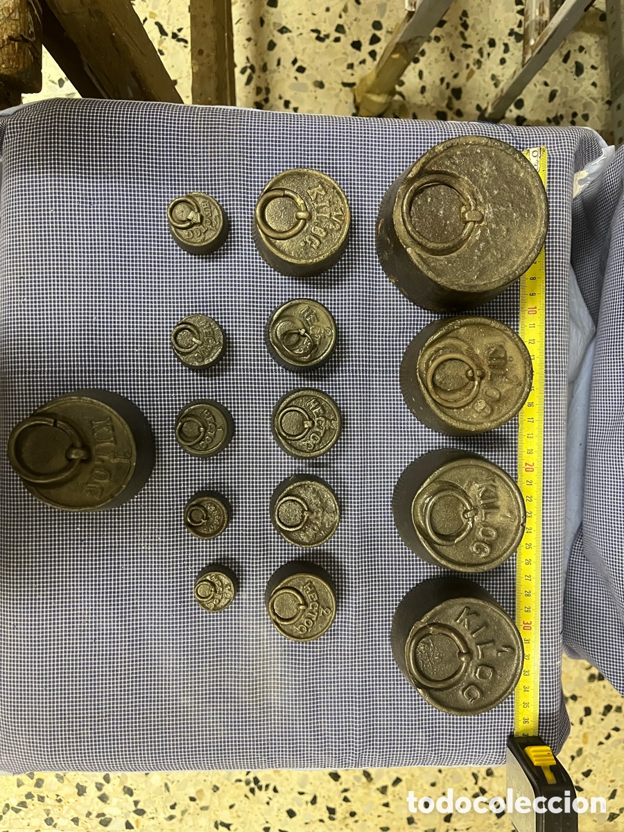 Antig&uuml;edades: Pesas antiguas de hierro para balanza