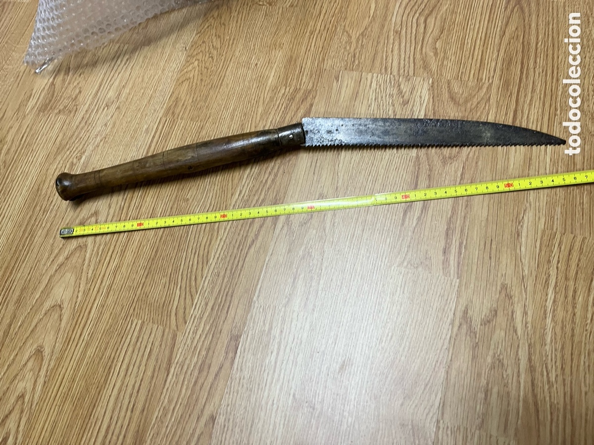 Antig&uuml;edades: Sierra plegable antigua con mango