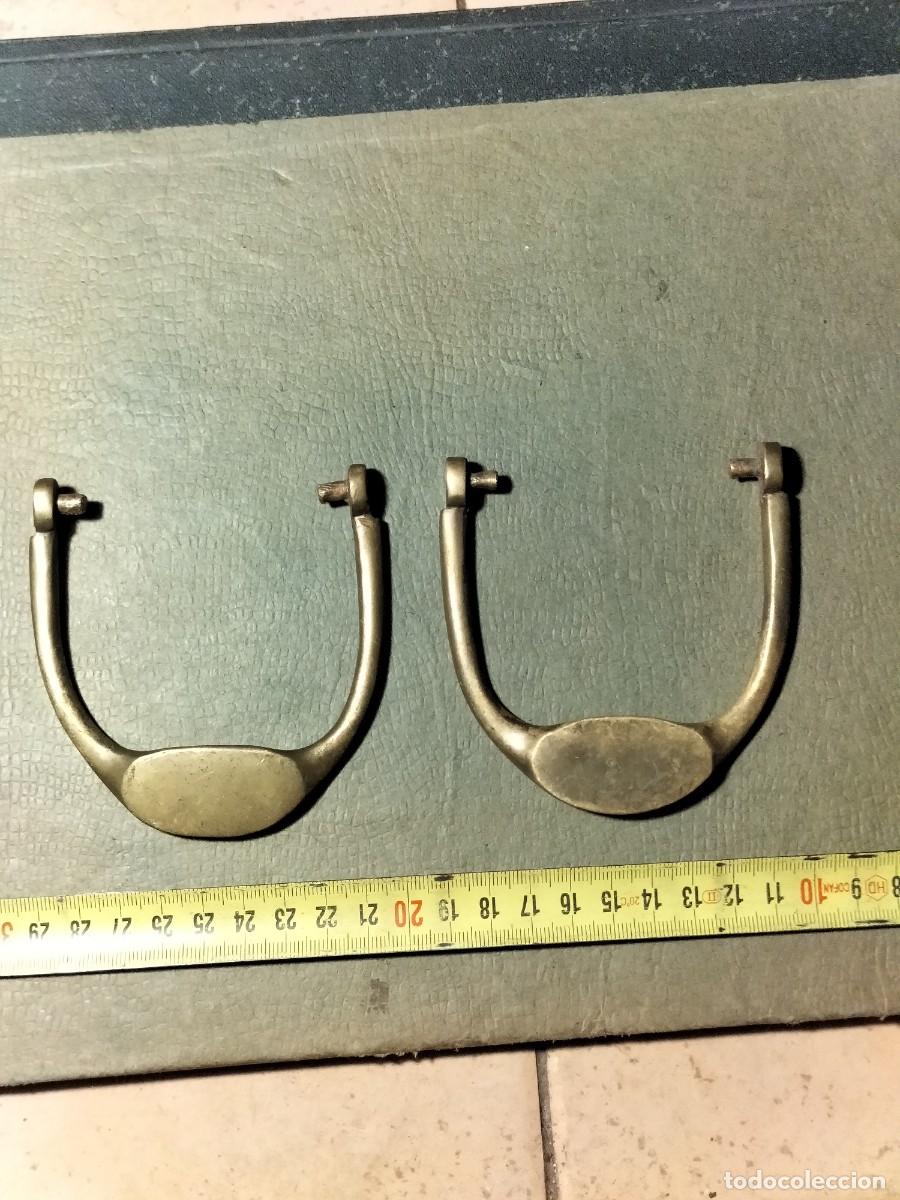 Antig&uuml;edades: Antiguos tiradores en bronce. RESTAURACIONES