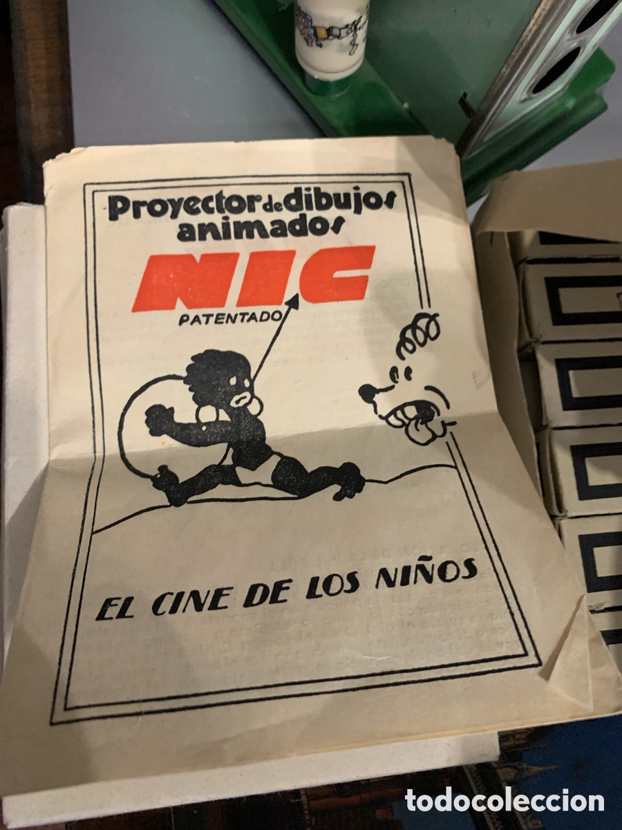 Antig&uuml;edades: PROYECTOR DE CINE NIC CON 2 CAJAS DE PEL&Iacute;CULAS - Foto 3