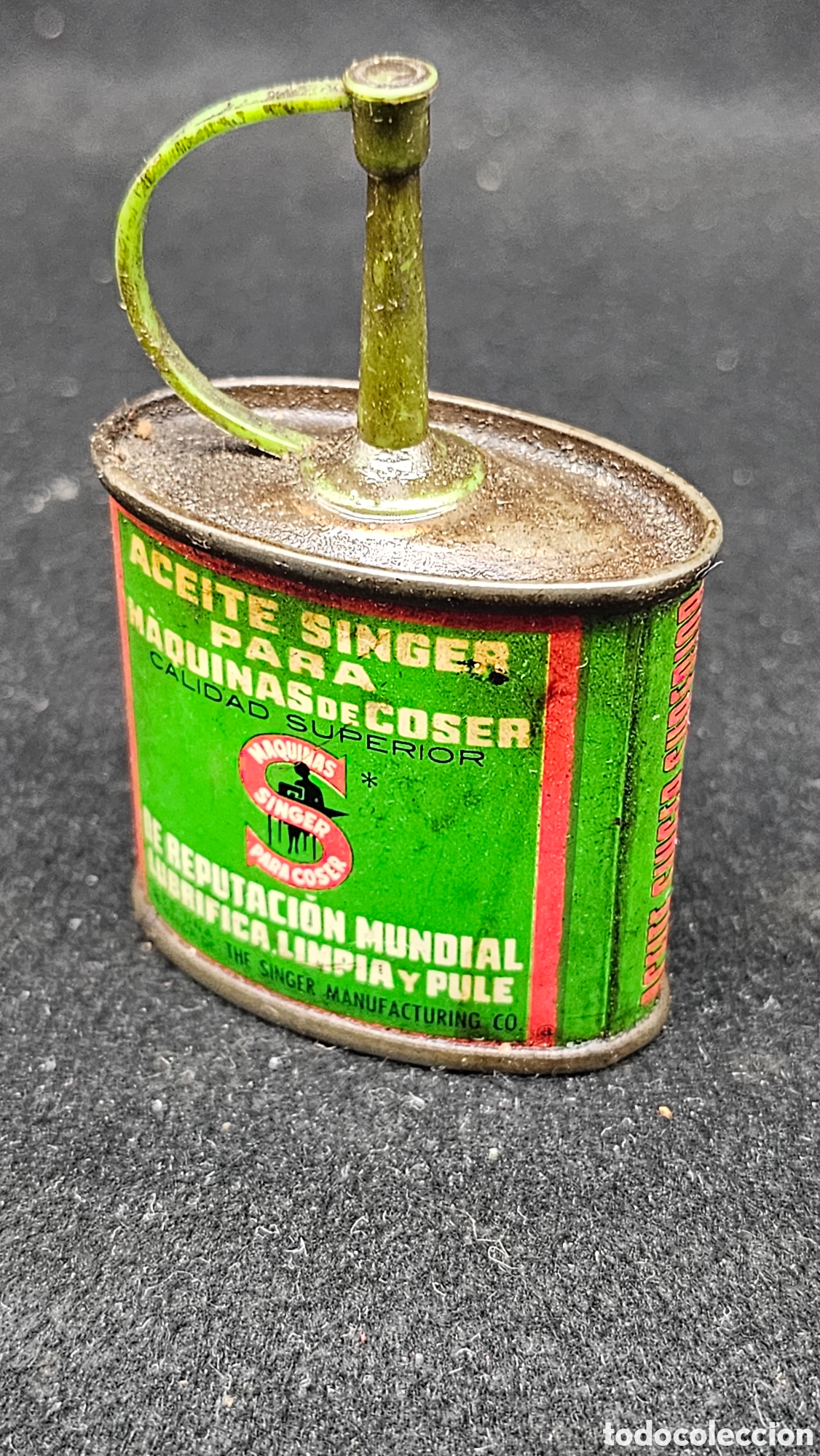 Antig&uuml;edades: Aceitera de m&aacute;quina de coser Singer