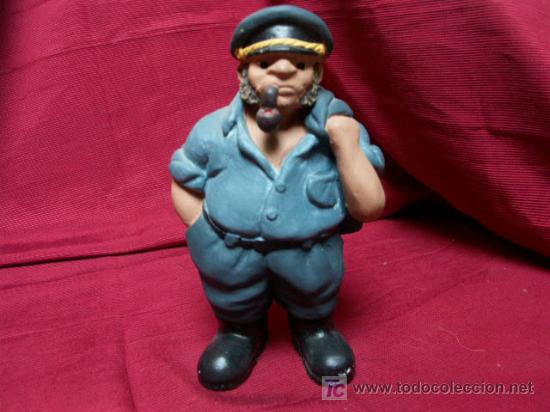 Antig&uuml;edades: marinero  con chaqueta al hombro de ceramica maciza