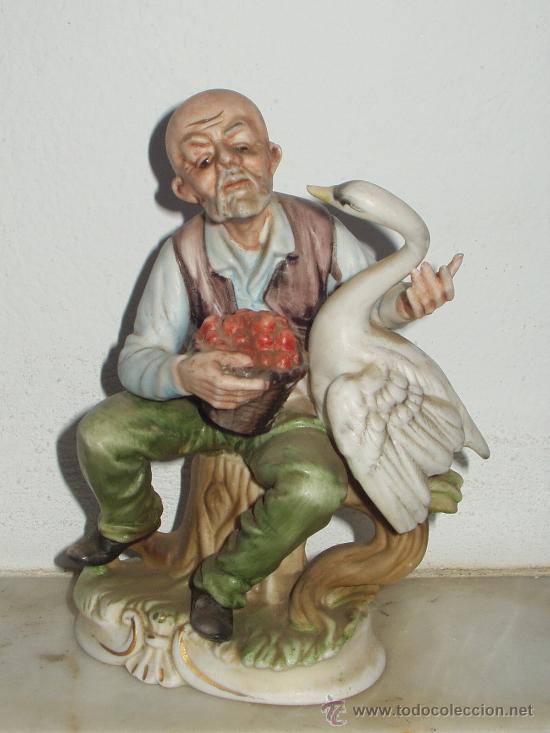 Antig&uuml;edades: FIGURA DE VIEJO CON PATO - Foto 1