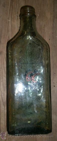 Antig&uuml;edades: Botella de cristal de 21 cms aprox. - Foto 1