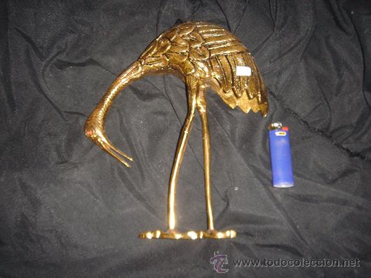 Antiguidades: figura de una ciguenya de lat&oacute;n. muy bonita y antigua