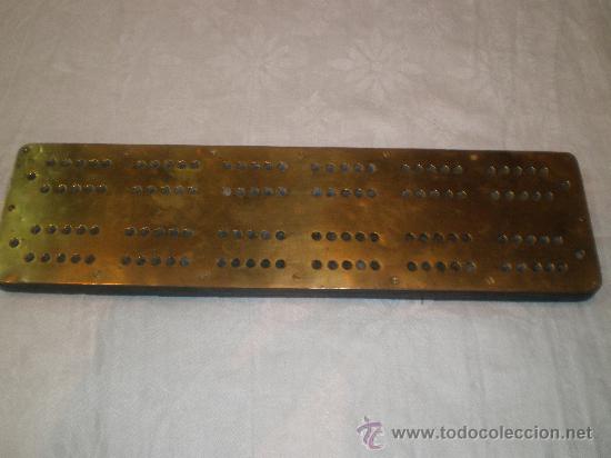 Antig&uuml;edades: tabla de laton con agujeros - Foto 1