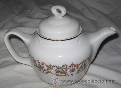 Antig&uuml;edades: TETERA DE PORCELANA - Foto 1