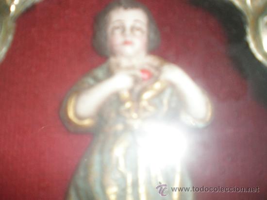 Antig&uuml;edades: marco de metal con santo - Foto 4