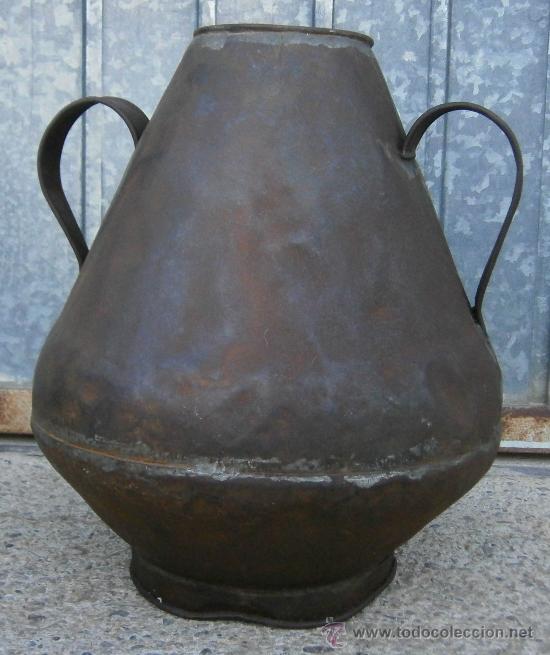 Antig&uuml;edades: Aceitera de lata de 35 cm. de alto aprox. - Foto 1
