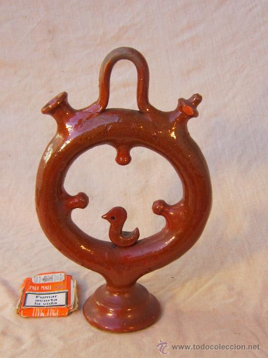 Antig&uuml;edades: BOTIJO EN FORMA DE RUEDA DE PATO - Foto 2
