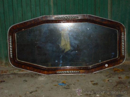 Antig&uuml;edades: Original marco en forma octogonal, aut&eacute;ntico art dec&oacute;, con relieves plateados