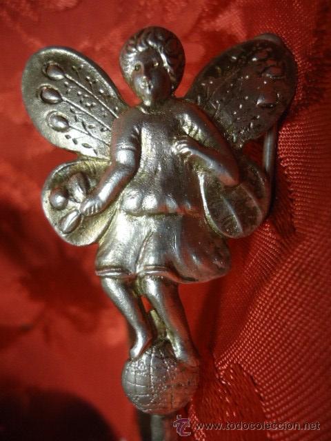 Antiques: Hada de plata con forma de gancho