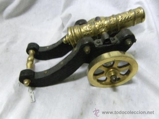 Antiquit&auml;ten: CA&Ntilde;ON DE ARTESANIA EN BRONCE Y ANTIGUO.