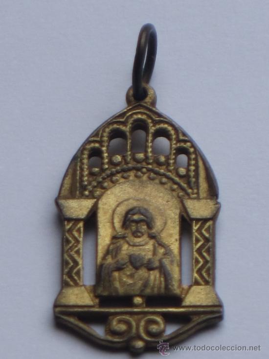 Antig&uuml;edades: MEDALLA ANTIGUA EN BRONCE CALADO. CORAZON DE JESUS.