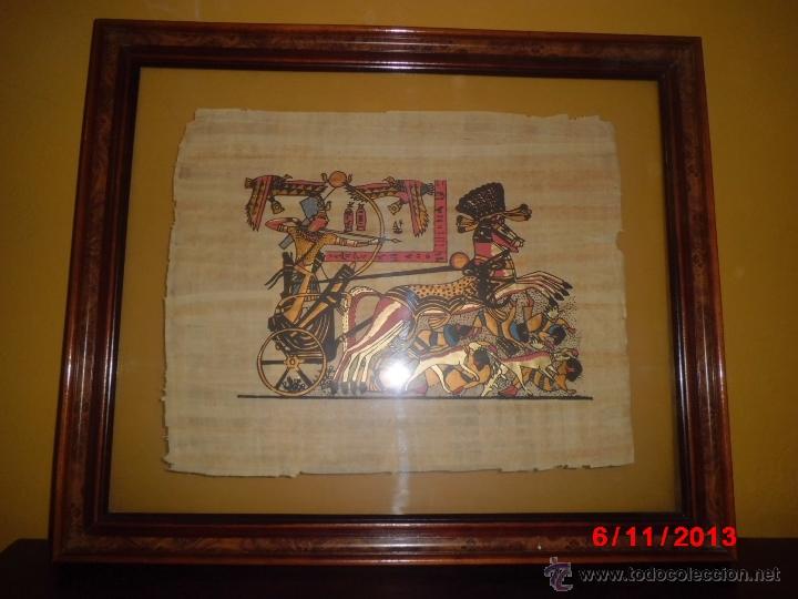 Antig&uuml;edades: CUADRO ENMARCADO DE UN PAPIRO CON SU CERTIFICADO EN LA PARTE TRASERA.