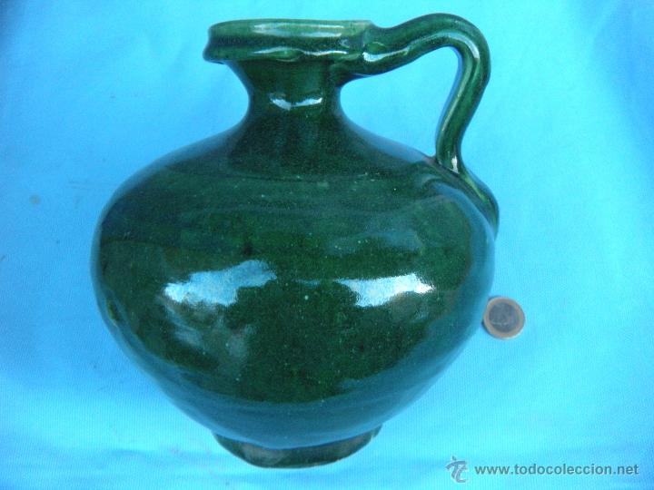 Antig&uuml;edades: ACEITERA BOTELLA DE BARRO ESMALTADO EN VERDE - Foto 1