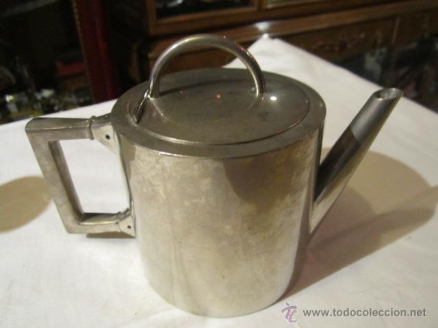 Antiguidades: Jarrita para t&eacute; o infusiones, en acero inoxidable, marca Ernesto Ferrer. 9 cms. altura x 9 di&aacute;metro.