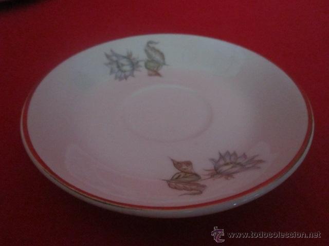 Antig&uuml;edades: G Ocho platos peque&ntilde;os para taza con decoraci&oacute;n floral. Tanagra Santander.