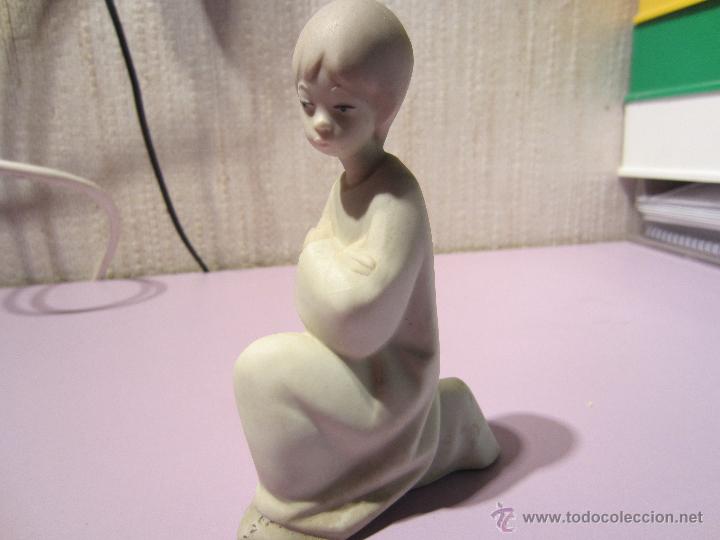 Antiques: figura de porcelana