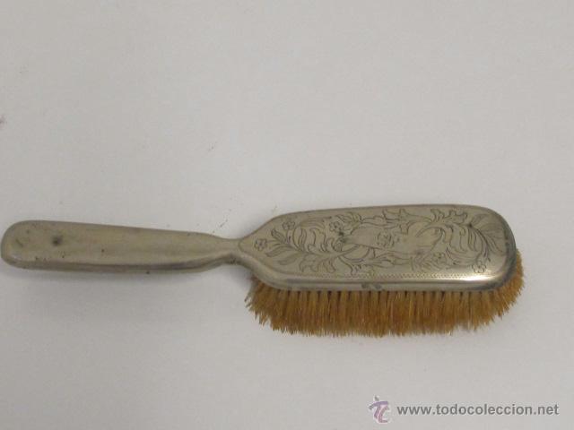 Antig&uuml;edades: Cepillo de metal con marcas de plata - Foto 1