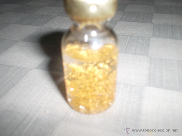 Antig&uuml;edades: botella con oro dentro - Foto 1