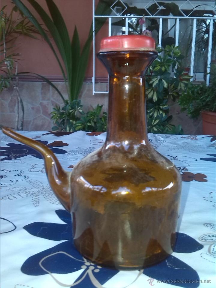 Antiquit&eacute;s: antiguo porron de vino en color ambar