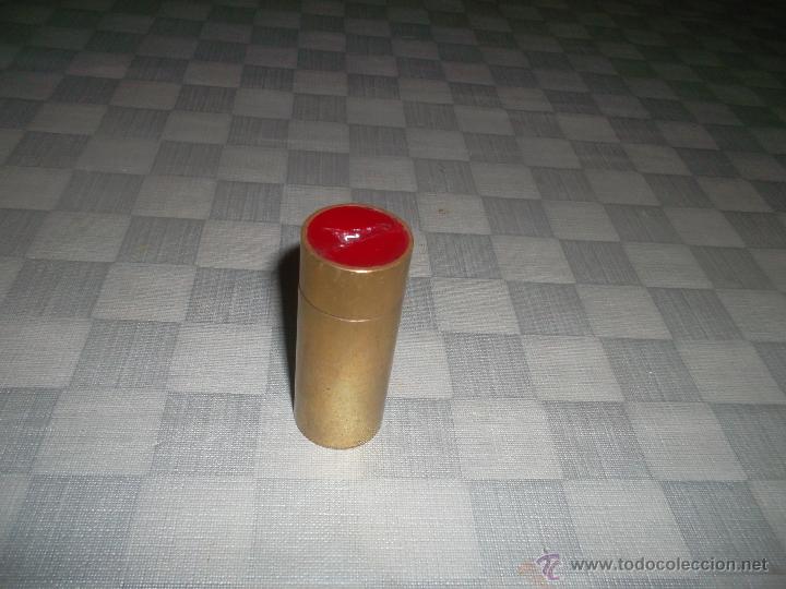 Antig&uuml;edades: pinta labio antiguo en bronce - Foto 1