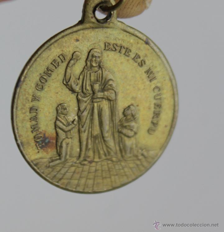 Antig&uuml;edades: M-99. MEDALLA EN BRONCE. RECUERDO DE LA 1&ordm; COMUNI&Oacute;N. - Foto 1