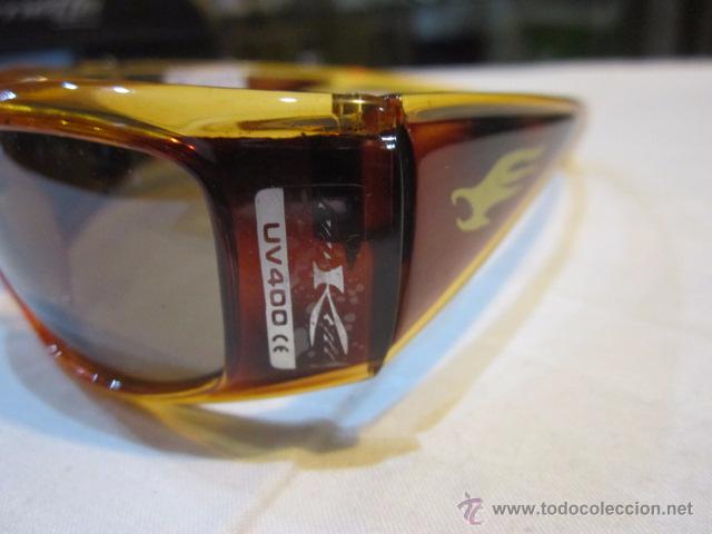 Antig&uuml;edades: Gafas de sol Arnette con su funda. 13 x 3,5 cms. - Foto 5