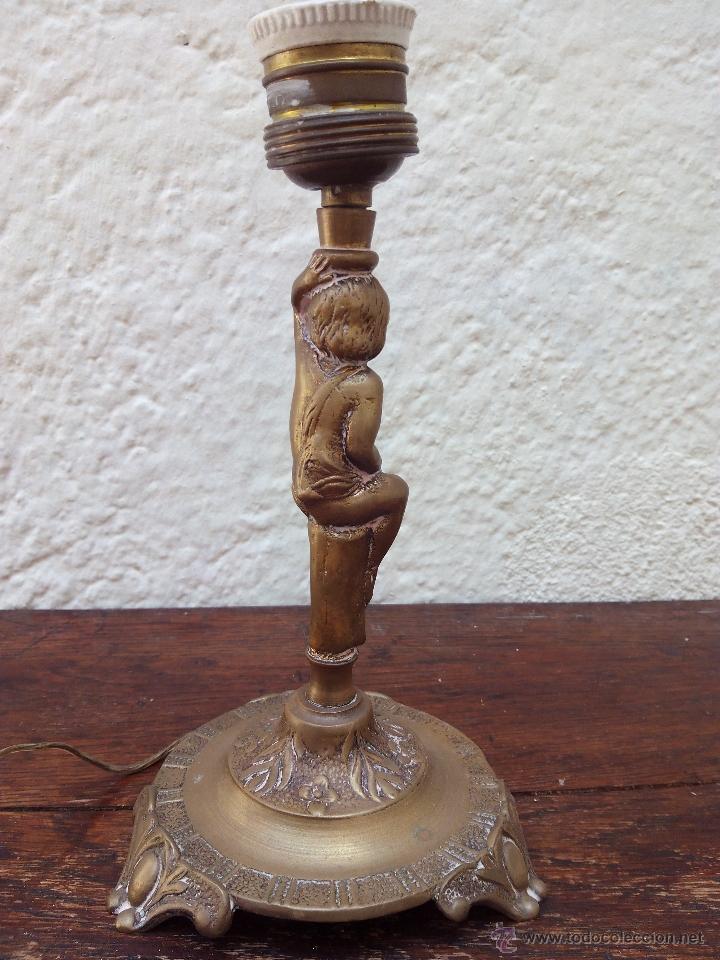 Antig&uuml;edades: L&aacute;mpara de bronce con un chico en aguantando la luz. - Foto 1