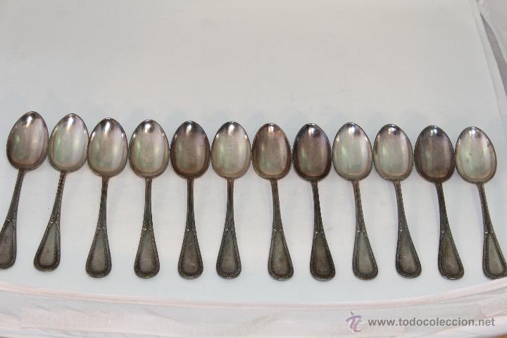 Antig&uuml;edades: 12 CUCHARAS PLATEADAS - Foto 1