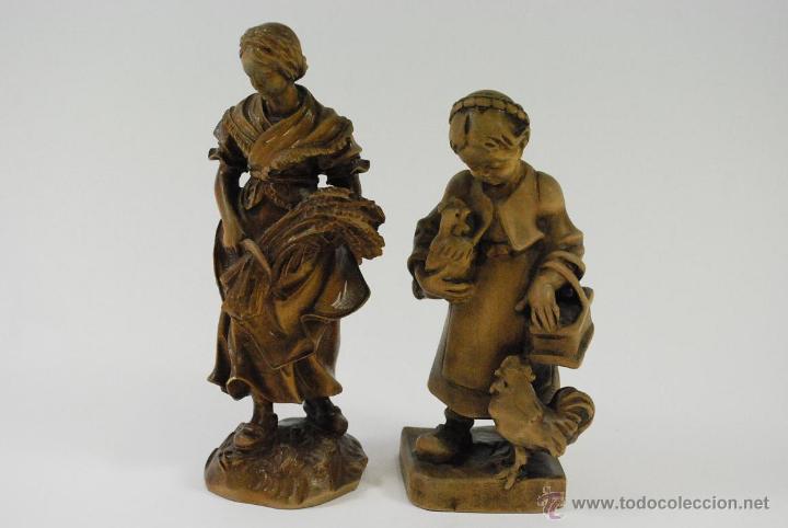 Antig&uuml;edades: Pareja de j&oacute;venes talladas en madera. - Foto 1