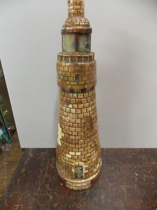 Antig&uuml;edades: botella ceramica triana xx - Foto 1