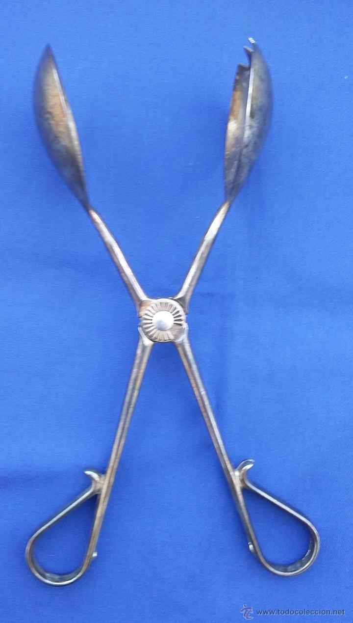 Antig&uuml;edades: Pinzas cuchara para servir - Foto 1