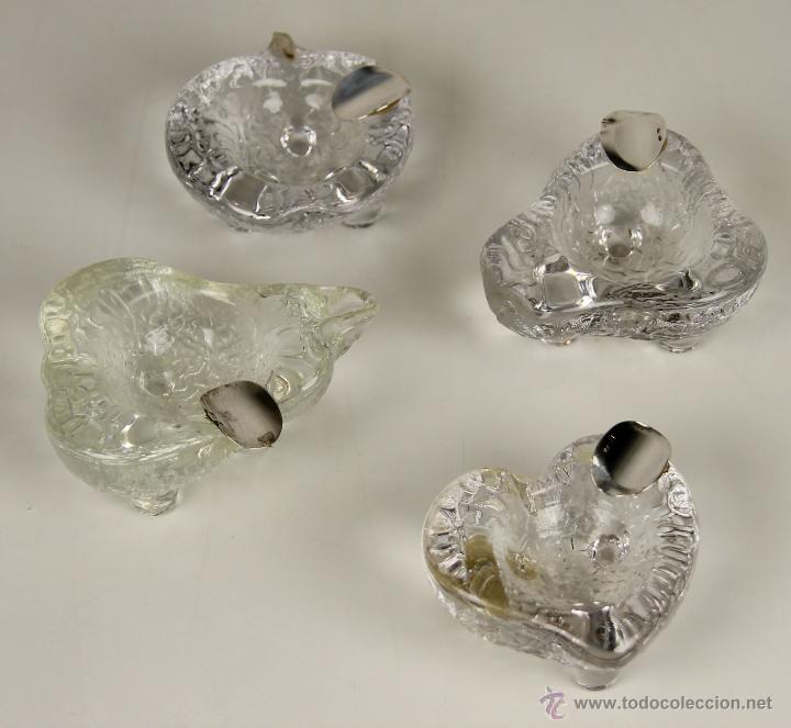 Antiguidades: COLECCI&Oacute;N DE 4 CENICEROS CON FORMAS EN CRISTAL TALLADO Y PLATA. SIGLO XX.
