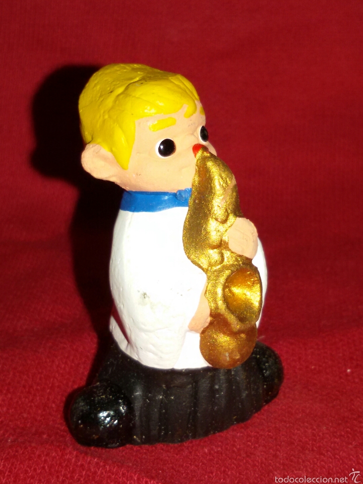 Antig&uuml;edades: FIGURA BARRO - CHICO CON SAXO - Foto 1