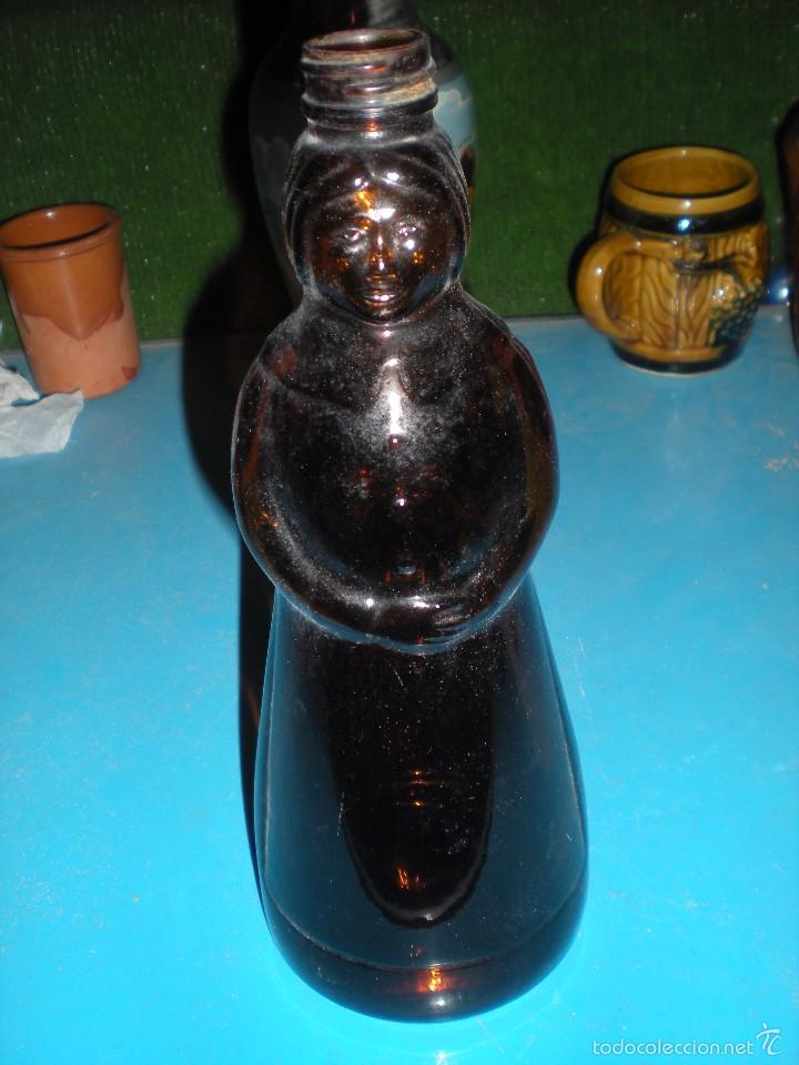 Antig&uuml;edades: Botella de vidrio con forma de se&ntilde;ora - Foto 1