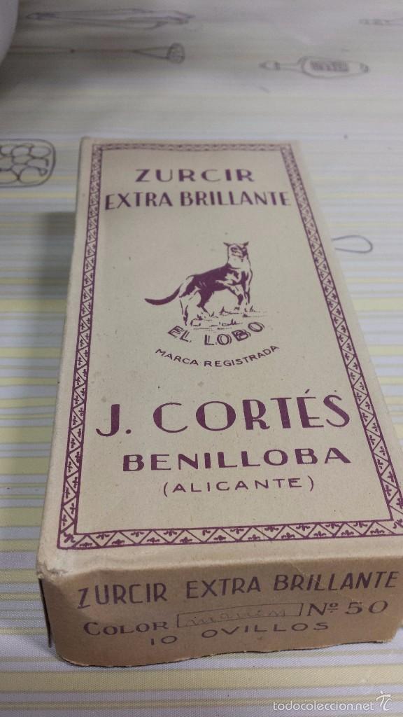 Antiques: antigua caja con  ovillos de hilo de zurcir j. cortes  benilloba(alicante) el lobo