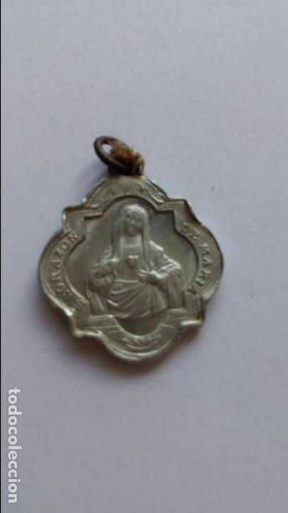 Antig&uuml;edades: Medalla de corazon de maria y corazon de jesus de 2,3 x 1,9 cms - Foto 1