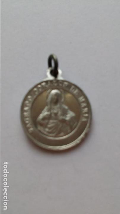 Antig&uuml;edades: Medalla de corazon de maria y corazon de jesus de 2 cms de diametro - Foto 1