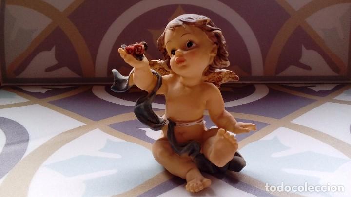 Antiguidades: &Aacute;ngel con flores