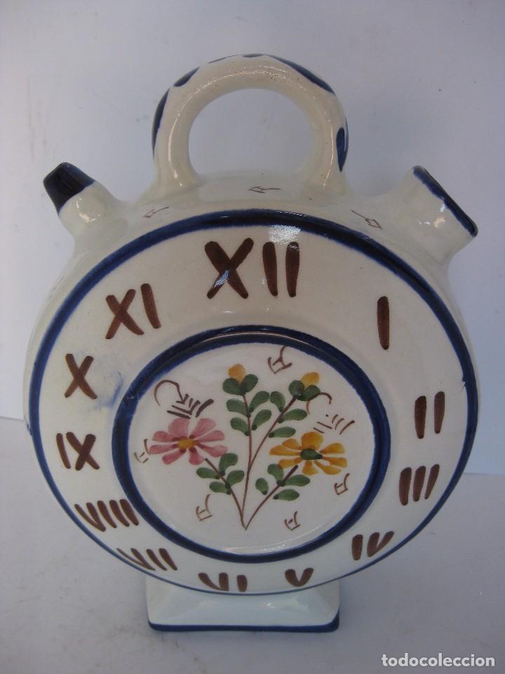 Antig&uuml;edades: Singular botijo en forma de reloj. - Foto 1