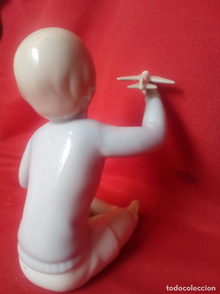 Antig&uuml;edades: NI&Ntilde;O VOLANDO UN AVION - Foto 5